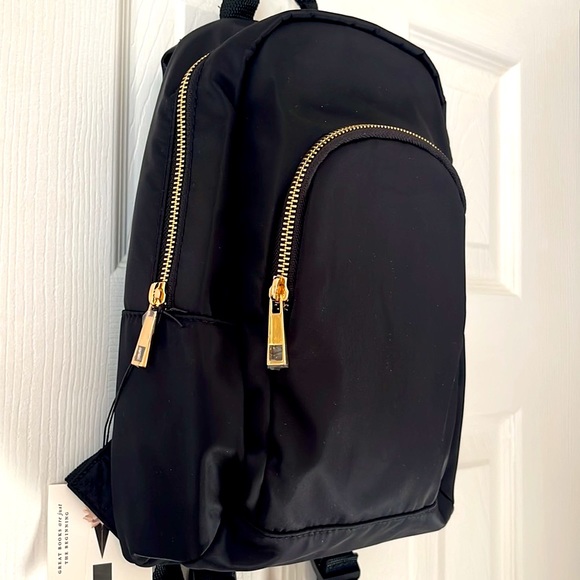 Indigo Handbags - 2/$15 NWT Indigo black nylon mini backpack.